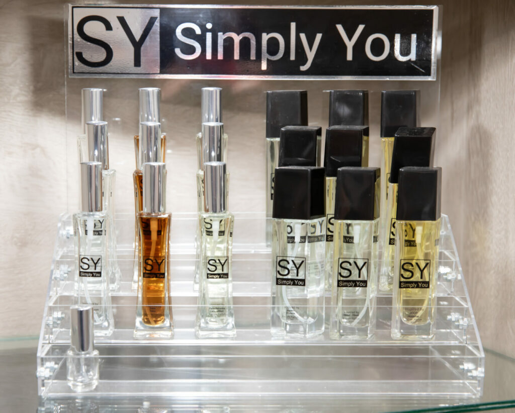 Exterior of Simply You Perfume shop at 26 Kerk Street Ermelo with a turquoise sign.